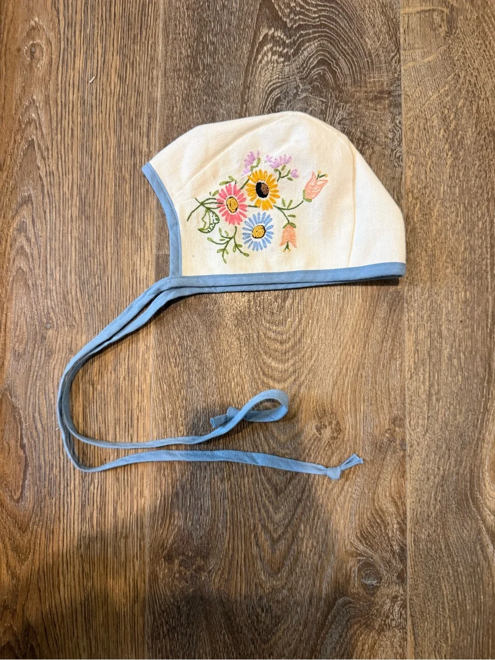 Embroidered Floral Kids Bonnet in Cream with Blue Trim